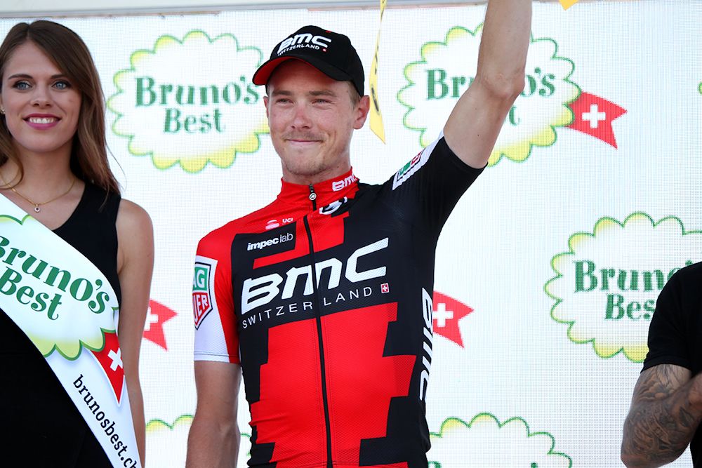Rohan Dennis on the stage 1 podium at Tour de Suisse