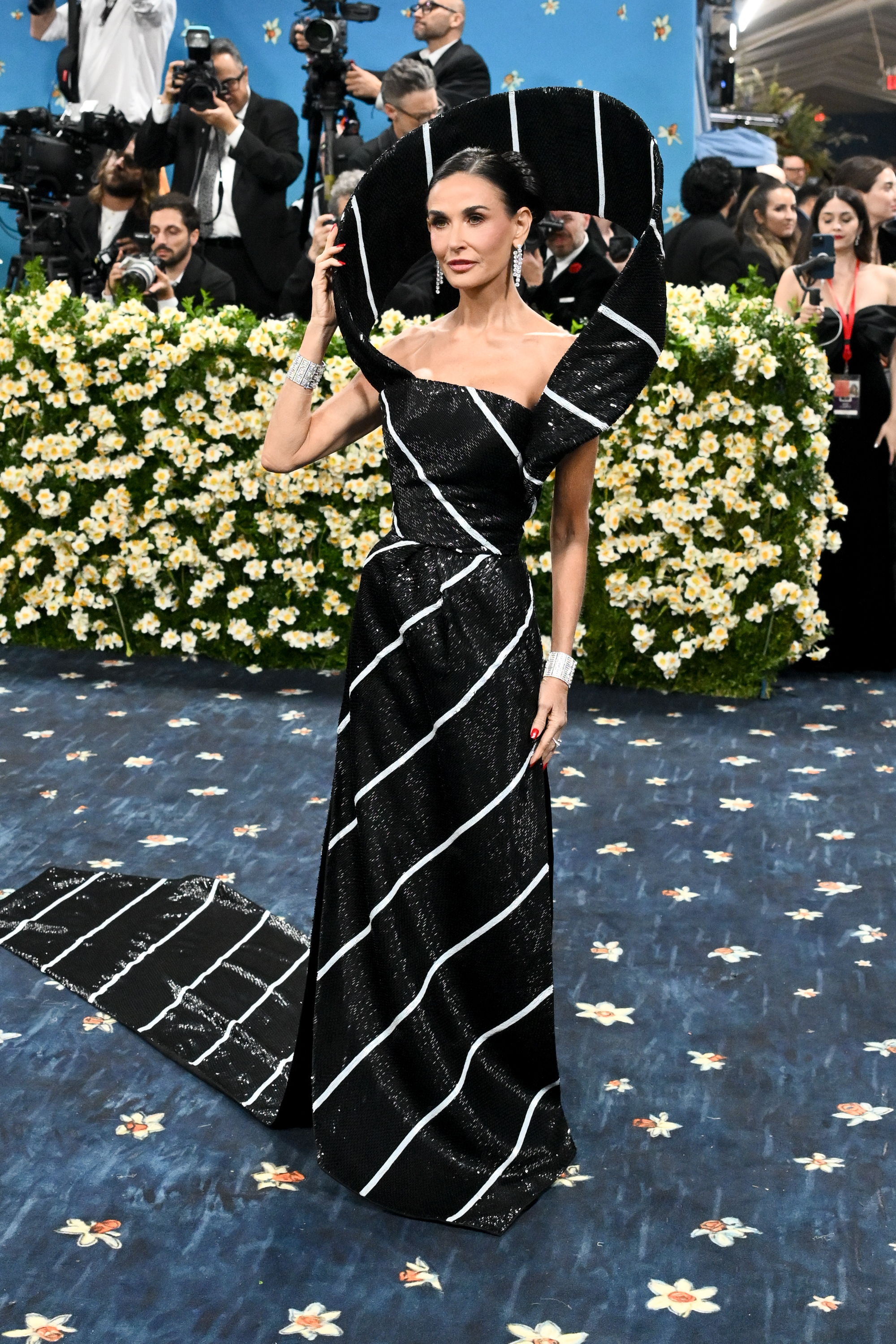 Demi Moore attends the 2025 Met Gala red carpet
