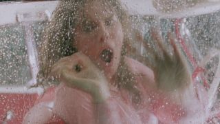 Alexandra Paul choking in John Carpenter's Christine