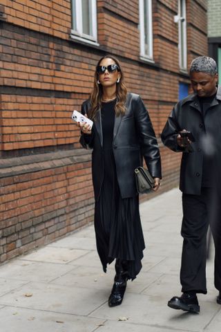 woman in leather jacket