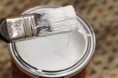 Gloss paint in white in a can