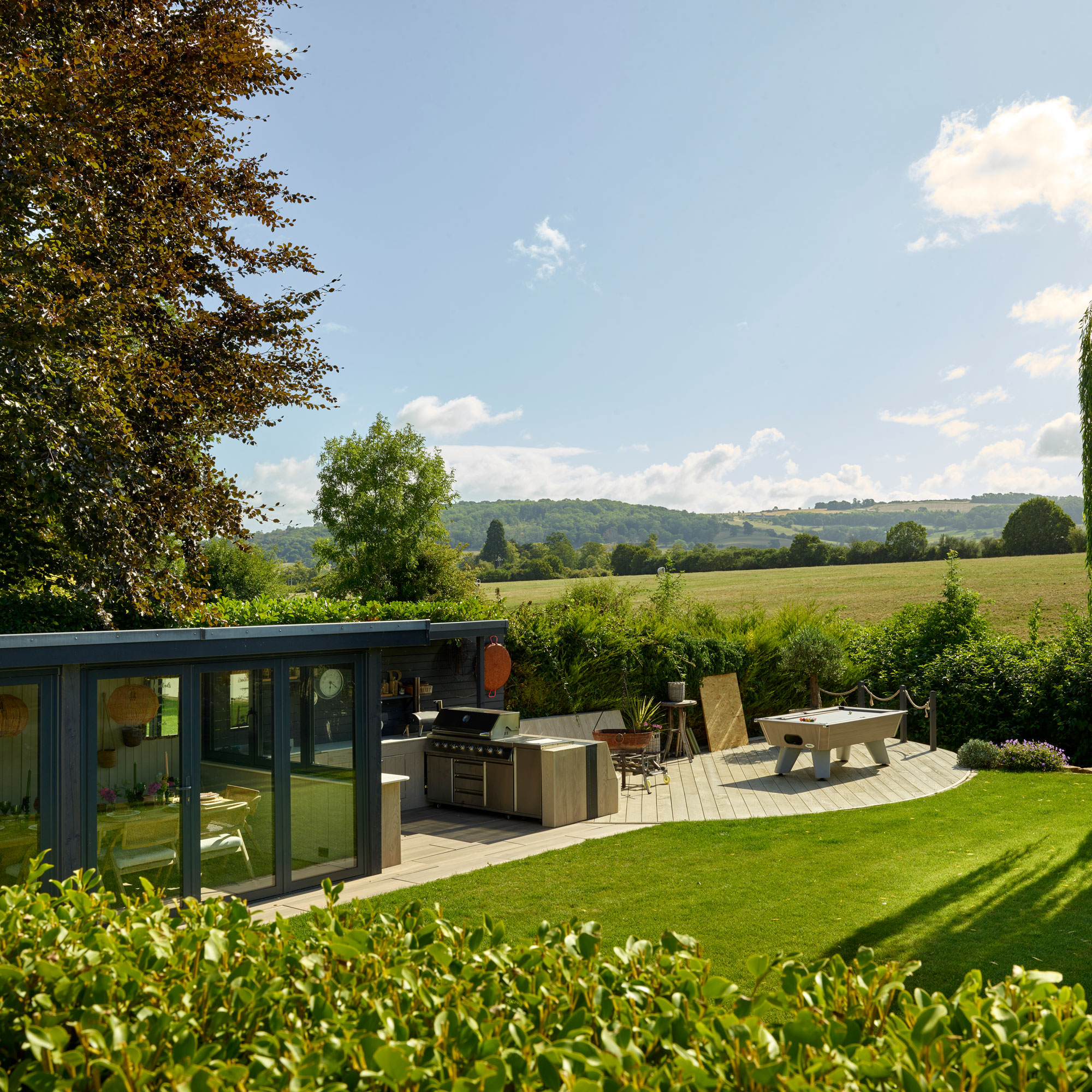 Green lawn and view from back of the house