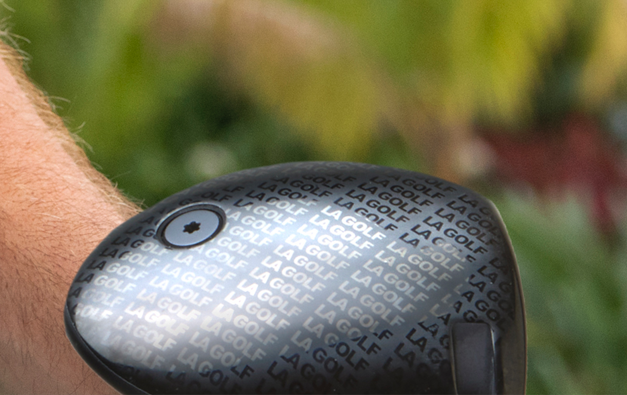 A close up of an LA Golf driver
