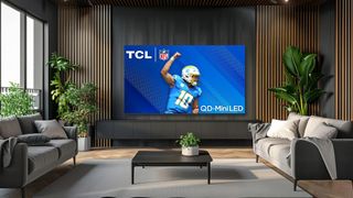 TCL Q Class TV QM851G lifestyle in living room.