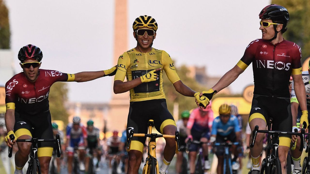 Team Ineos riders Jonathan Castroviejo (left) and Geraint Thomas (right) congratulate Egan Bernal on his Tour de France win