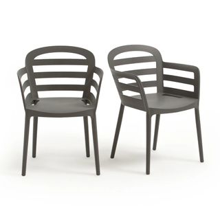 Two contemporary black plastic garden chairs