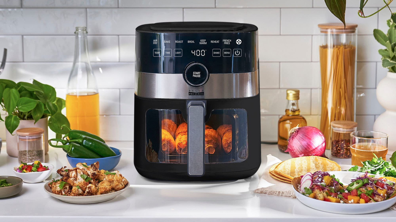 Bella Pro Series 6-qt. air fryer surrounded by healthy dishes