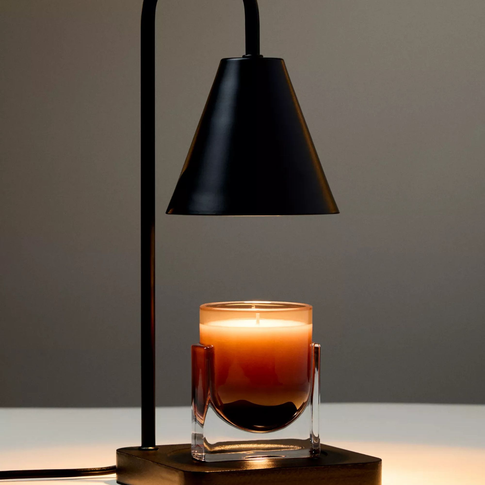 Black metal candle warmer