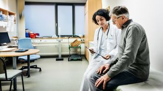 A patient talks to their doctor.