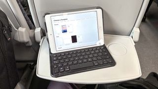 iPad mini on a UK train with a Bluetooth keyboard attached