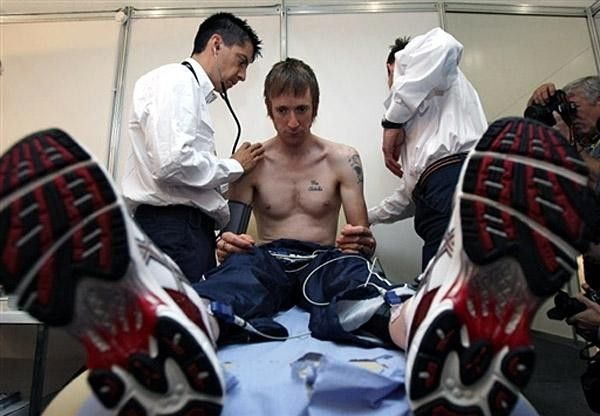 Wiggins sits the customary pre-Tour