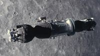 an astronaut climbs along the outside of a cylindrical spacecraft above the moon