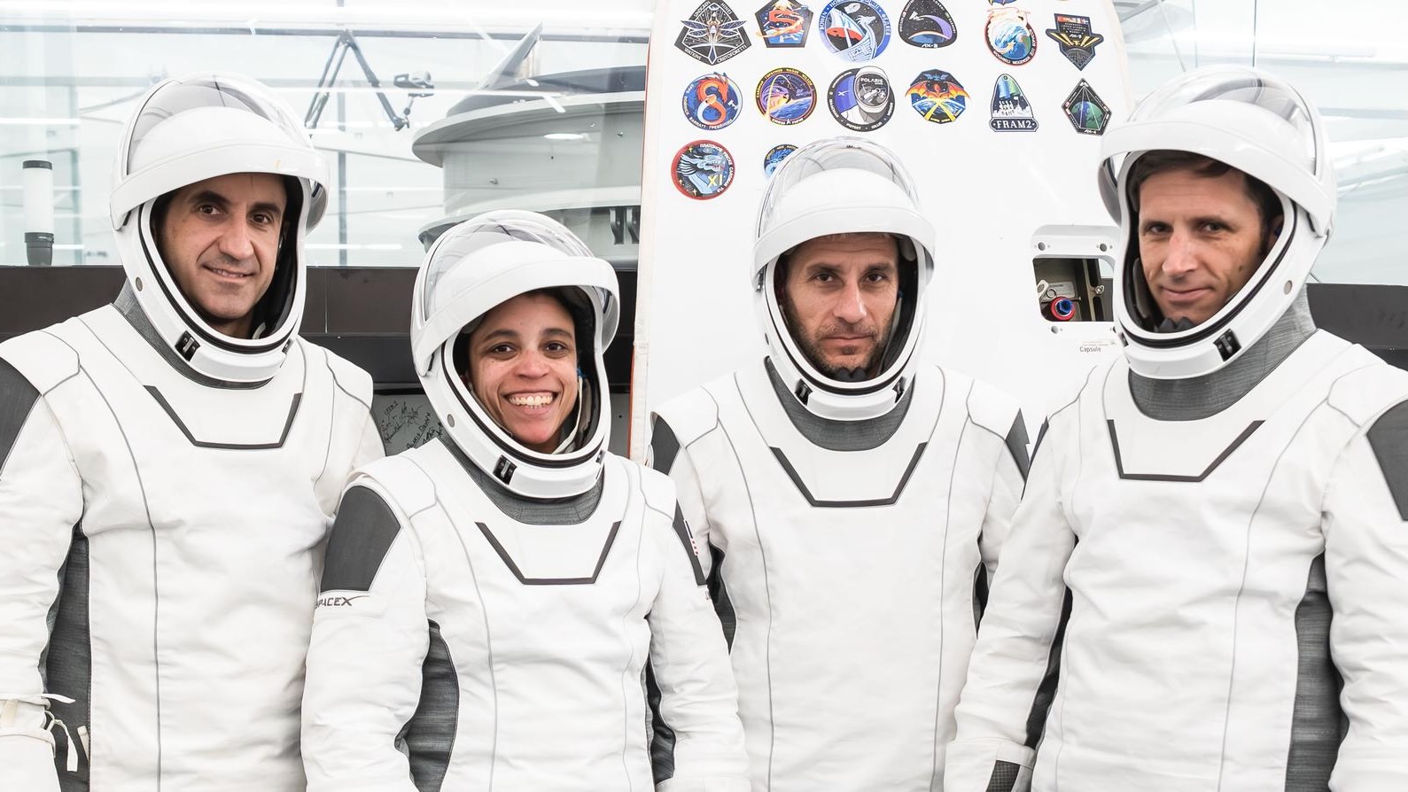 The Crew-13 members pose for a portrait in their pressure suits during a preflight training session at SpaceX headquarters in Hawthorne, California. From left: Roscosmos' Sergey Teteryatnikov, NASA astronauts Jessica Watkins and Luke Delaney, and Canadian Space Agency astronaut Joshua Kutryk.