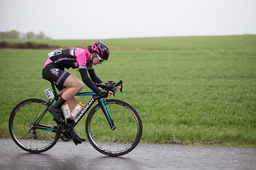Amy Gornall (GBR) of Podium Ambition Cycling Team battles the elements on her own during the first, 106.9km road race stage of Elsy Jacobs