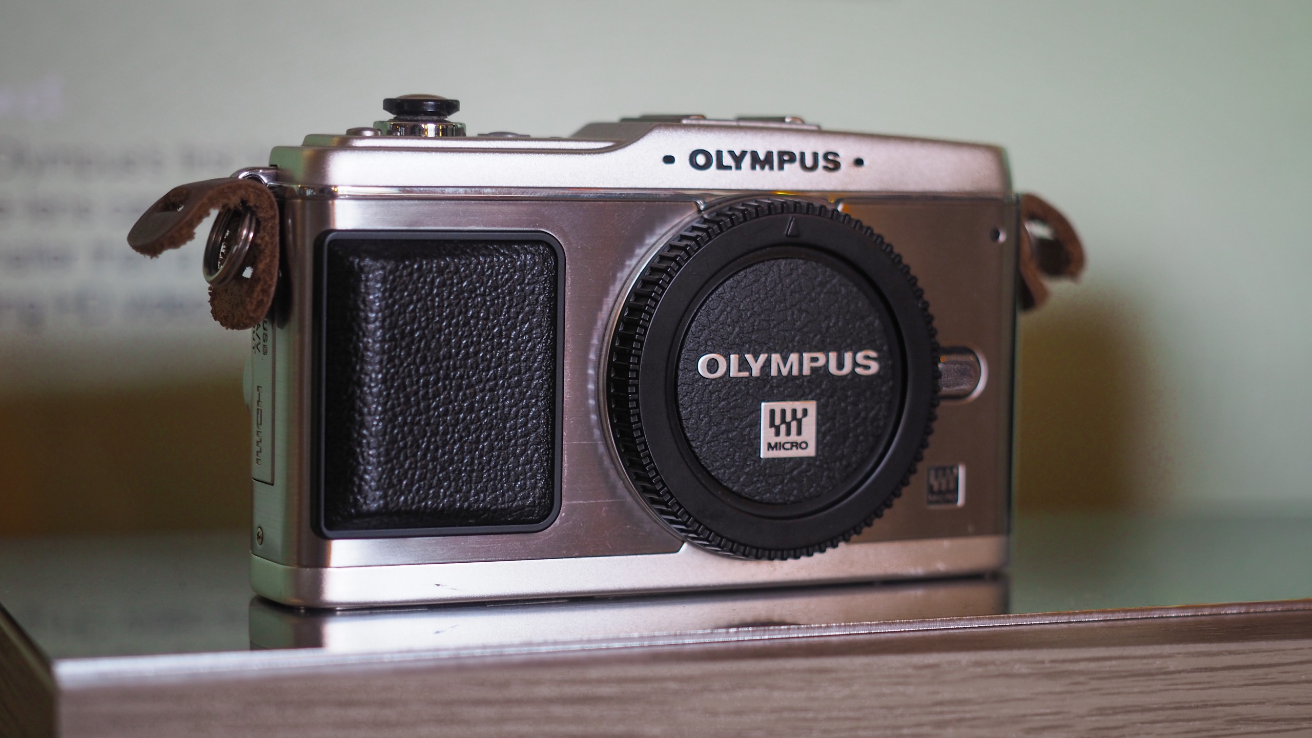 Olympus PEN E-P1 on a metallic surface