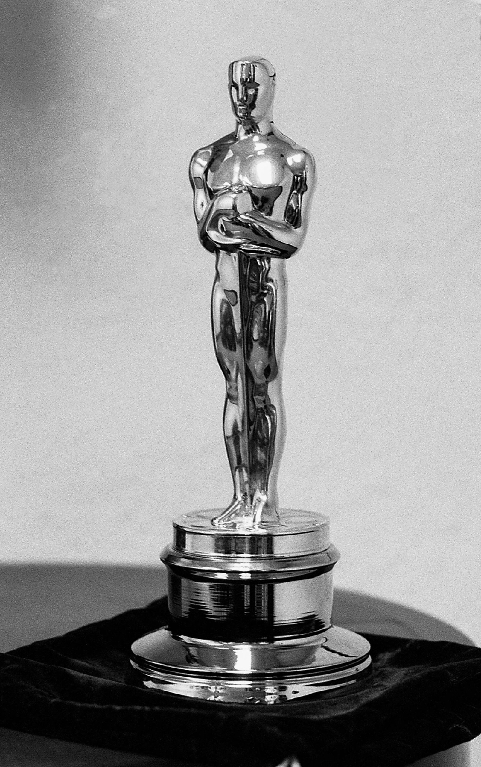 Black and white image of a Oscar statuette