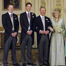 WINDSOR, ENGLAND - APRIL 9: (EMBARGOED TILL 0001 BST MONDAY 11 APRIL 2005) TRH Prince Charles and The Duchess Of Cornwall, Camilla Parker Bowles pose with their children (L-R) Prince Harry, Prince William, Laura and Tom Parker Bowles, in the white drawing room for the Official Wedding group photo following their earlier marriage at The Guildhall, at Windsor Castle on April 9, 2005 in Berkshire, England. (Photo by Hugo Bernand/ROTA/Anwar Hussein Collection/Getty Images) 