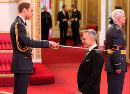 Check out a delightfully dapper Daniel Day Lewis getting knighted by Prince William