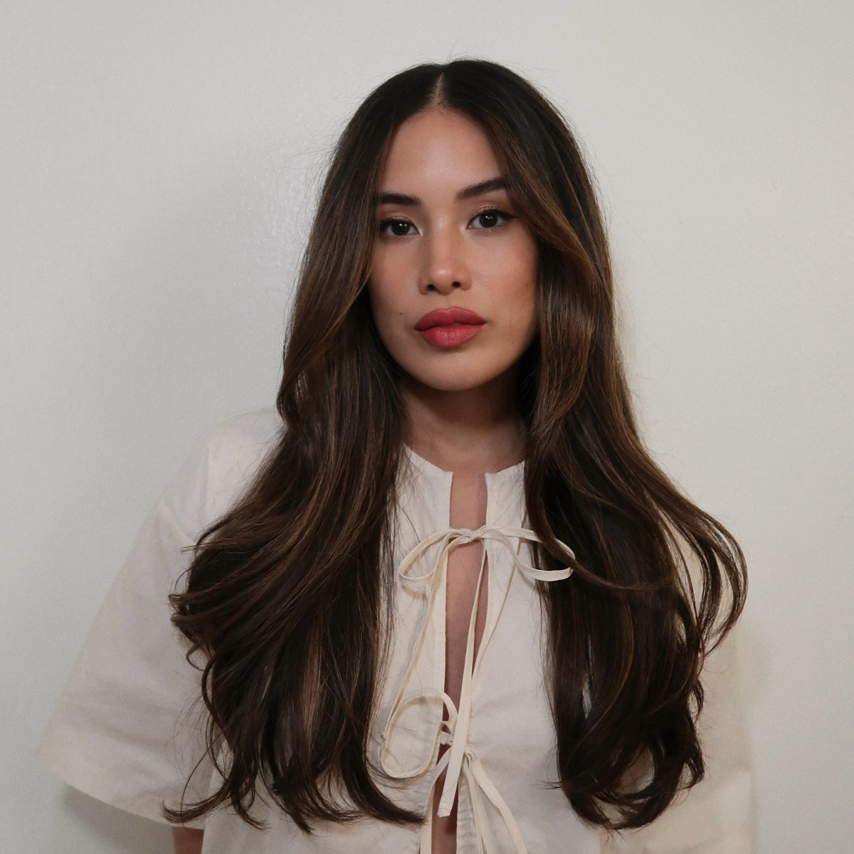 A woman with rich brunette hair