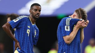 Sweden's Alexander Isak stands with his hands on his hips as Viktor Gyokeres buries his face in his shirt at World Cup 2026
