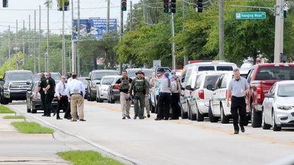 Investigators at scene of shooting in Orlando, FL.