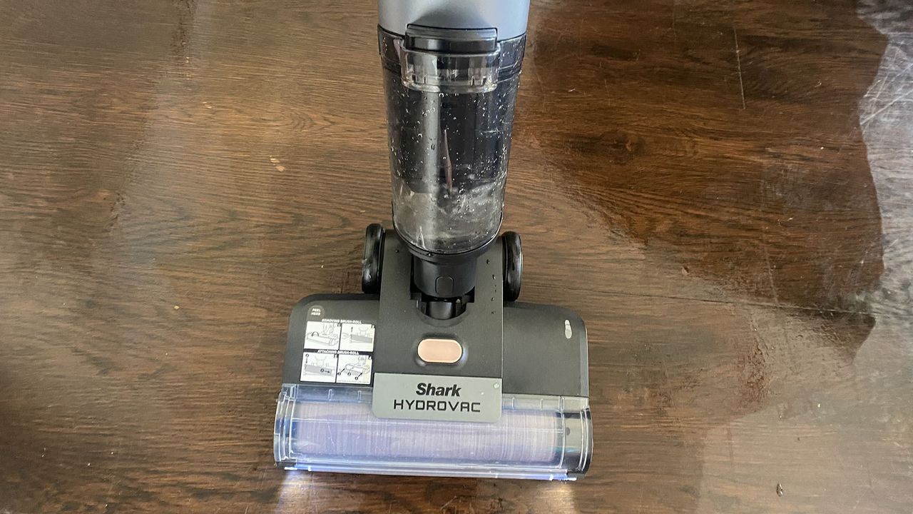 Close up of dirty water tank on Shark HydroVac Cordless floor cleaner