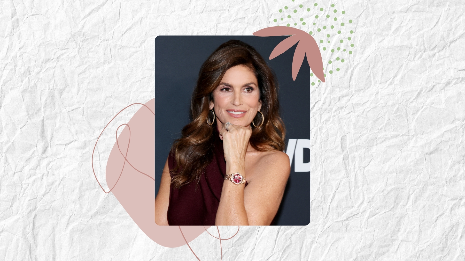 Cindy Crawford is pictured with voluminous, wavy hair whilst attending the 2026 WWD Style Awards presented by Women's Wear Daily at Regent Santa Monica Beach on January 09, 2026, in Santa Monica, California/ in a white, paper texture template with pink and green dots and lines