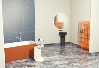 Orange bath tub with storage shelves, marble swirl flooring