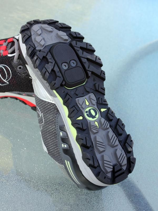 The full coverage tread on Pearl Izumi's X-Alp Seek looks to provide plenty of grip over unsure terrain.