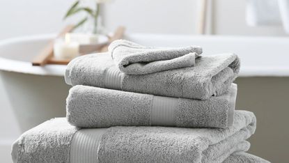 Egyptian cotton towels from The White Company by a bath tub