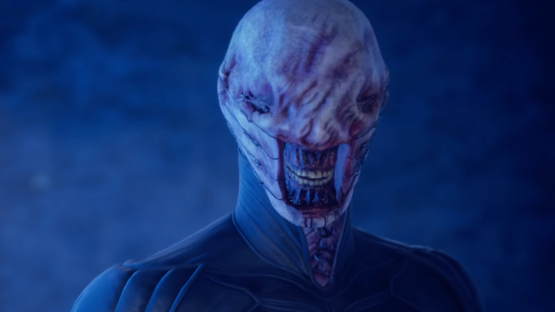 The Chatterer grimaces in blue light