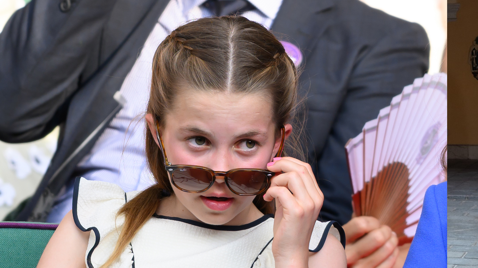 Princess Charlotte pulling her sunglasses down her nose