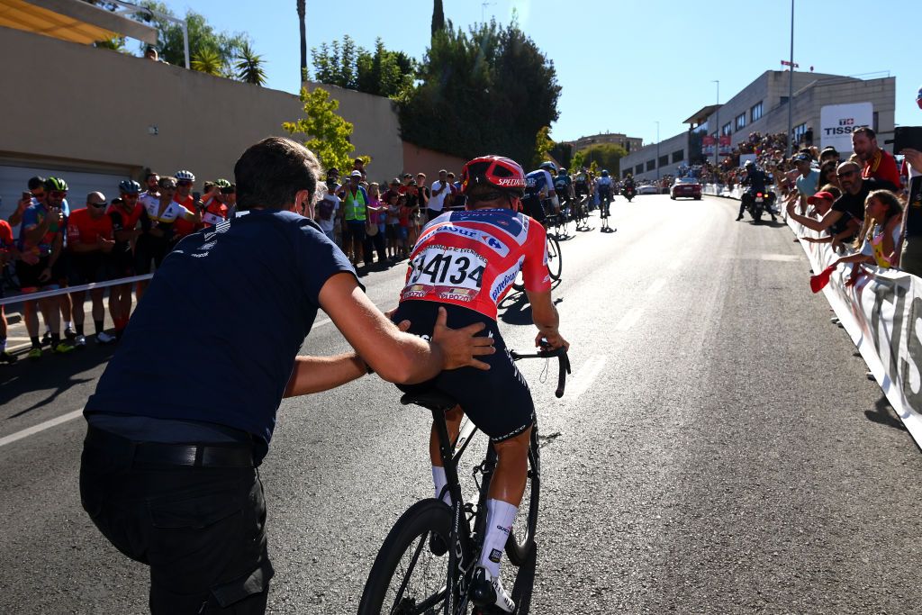 TOMARES SPAIN SEPTEMBER 06 Remco Evenepoel of Belgium and Team QuickStep Alpha Vinyl Red Leader Jersey dropped from the peloton after a mechanical problem in the final kilometres during the 77th Tour of Spain 2022 Stage 16 a 1894km stage from Sanlcar de Barrameda to Tomares LaVuelta22 WorldTour on September 06 2022 in Tomares Spain Photo by Tim de WaeleGetty Images