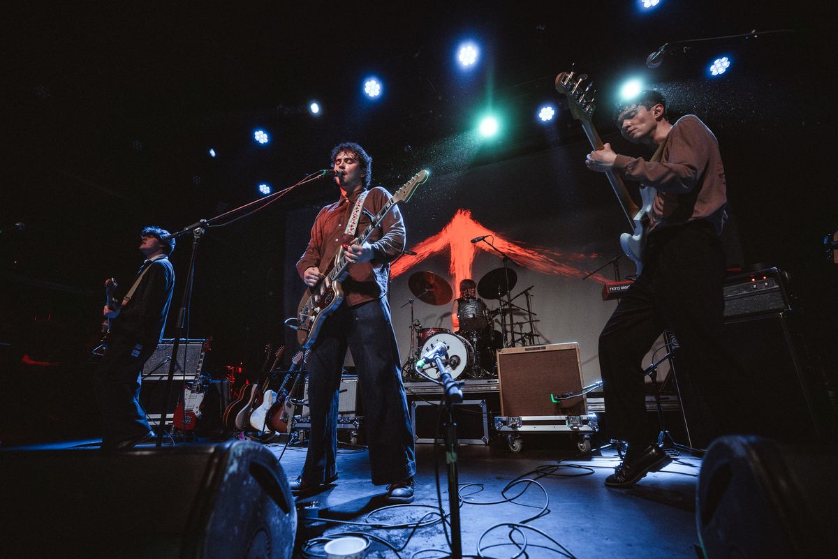 Friko playing live on stage