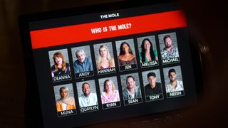 A still from 'The Mole' season 2 showing the ten contestants on a laptop 