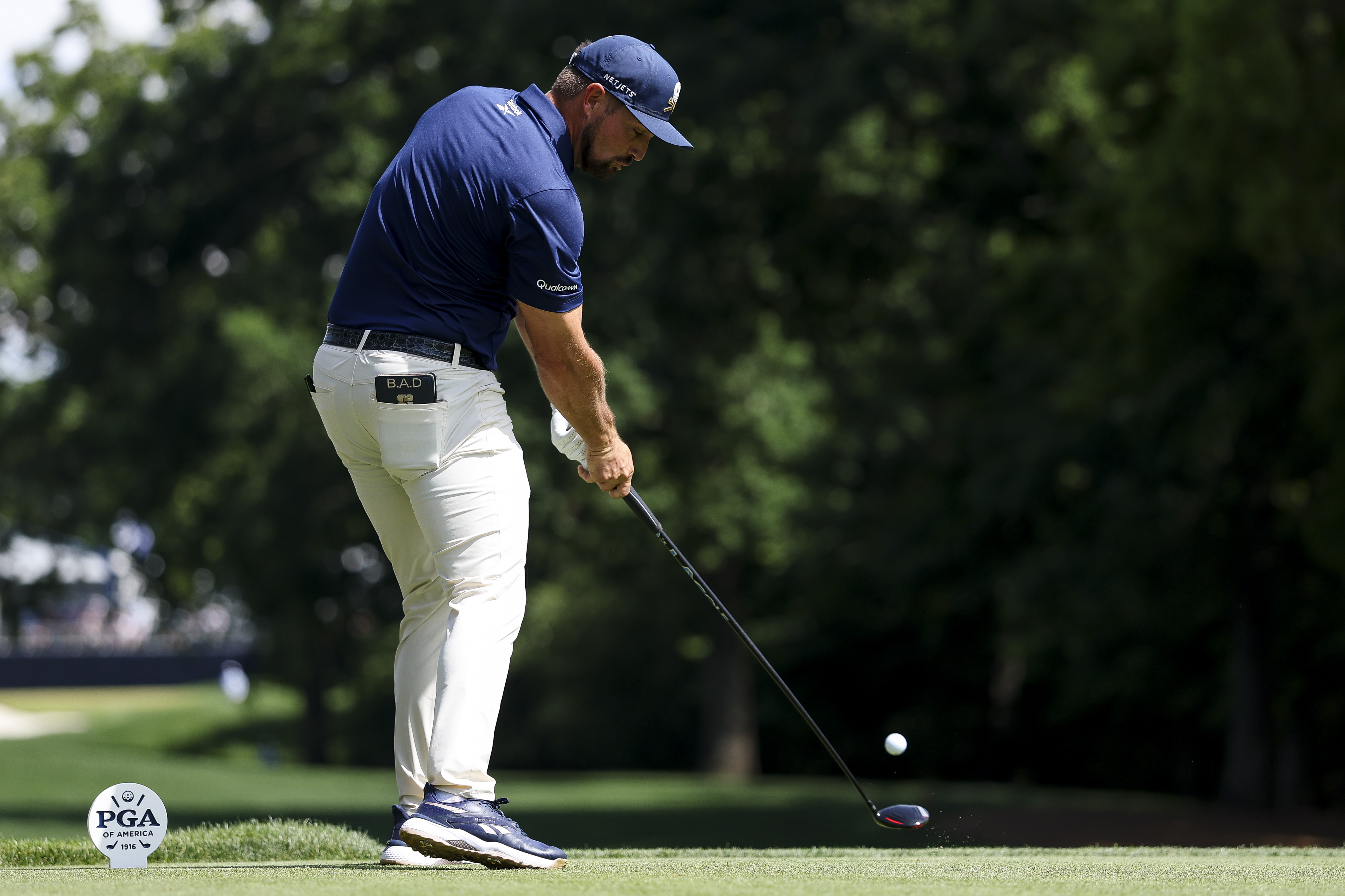 Bryson DeChambeau hits a tee shot