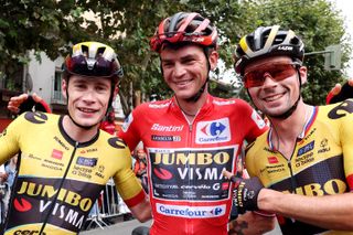 GUADARRAMA SPAIN SEPTEMBER 16 LR Jonas Vingegaard of Denmark Sepp Kuss of The United States Red Leader Jersey final overall winner and Primo Roglic of Slovenia and Team JumboVisma celebrate the victory during the 78th Tour of Spain 2023 Stage 20 a 2078km stage from Manzanares El Real to Guadarrama UCIWT on September 16 2023 in Guadarrama Spain Photo by Alexander HassensteinGetty Images