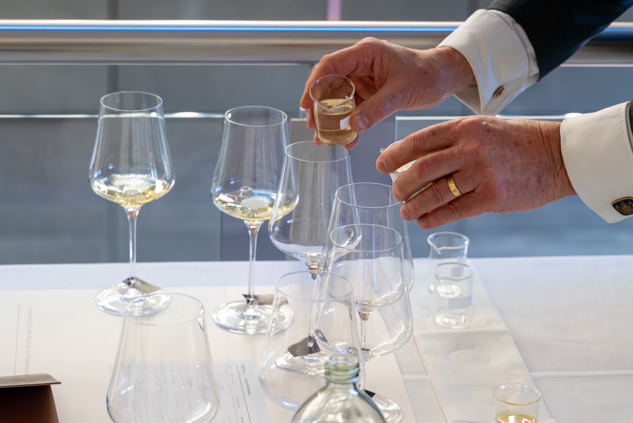 Pouring Chardonnay at the Opposites Attract tasting in Christchurch