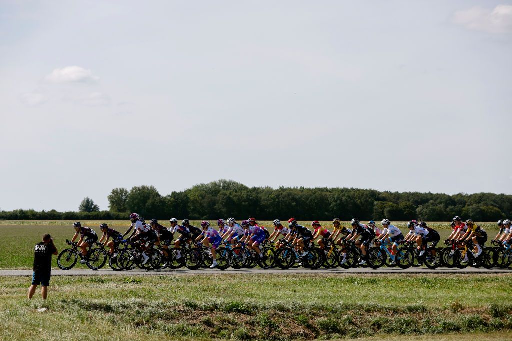 LELYSTAD NETHERLANDS AUGUST 30 A general view of the peloton passing through a landscape during the 25th Simac Ladies Tour 2022 Stage 1 a 1412km stage from Lelystad to Lelystad SLT2022 UCIWWT on August 30 2022 in Lelystad Netherlands Photo by Bas CzerwinskiGetty Images