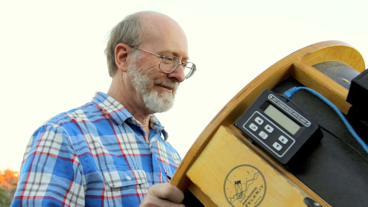 Astronomer Don Machholz looking into a telescope