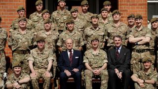 Prince Philip, The Duke Of Edinburgh in his capacity of Colonel, Grenadier Guards poses for a group photograph with officers from 1st Battalion Grenadier Guards