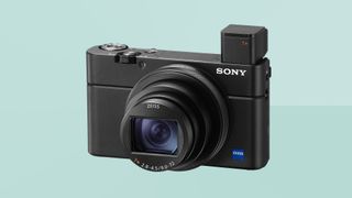 Sony RX100 VII on a blue background