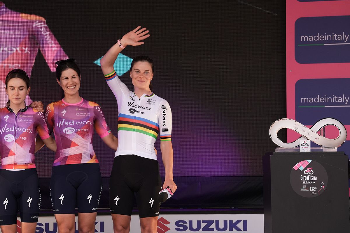 World Champion Lotte Kopecky on stage at the 2024 Giro d'Italia Women at the teams presentation at the Piazza della Loggia in Brescia