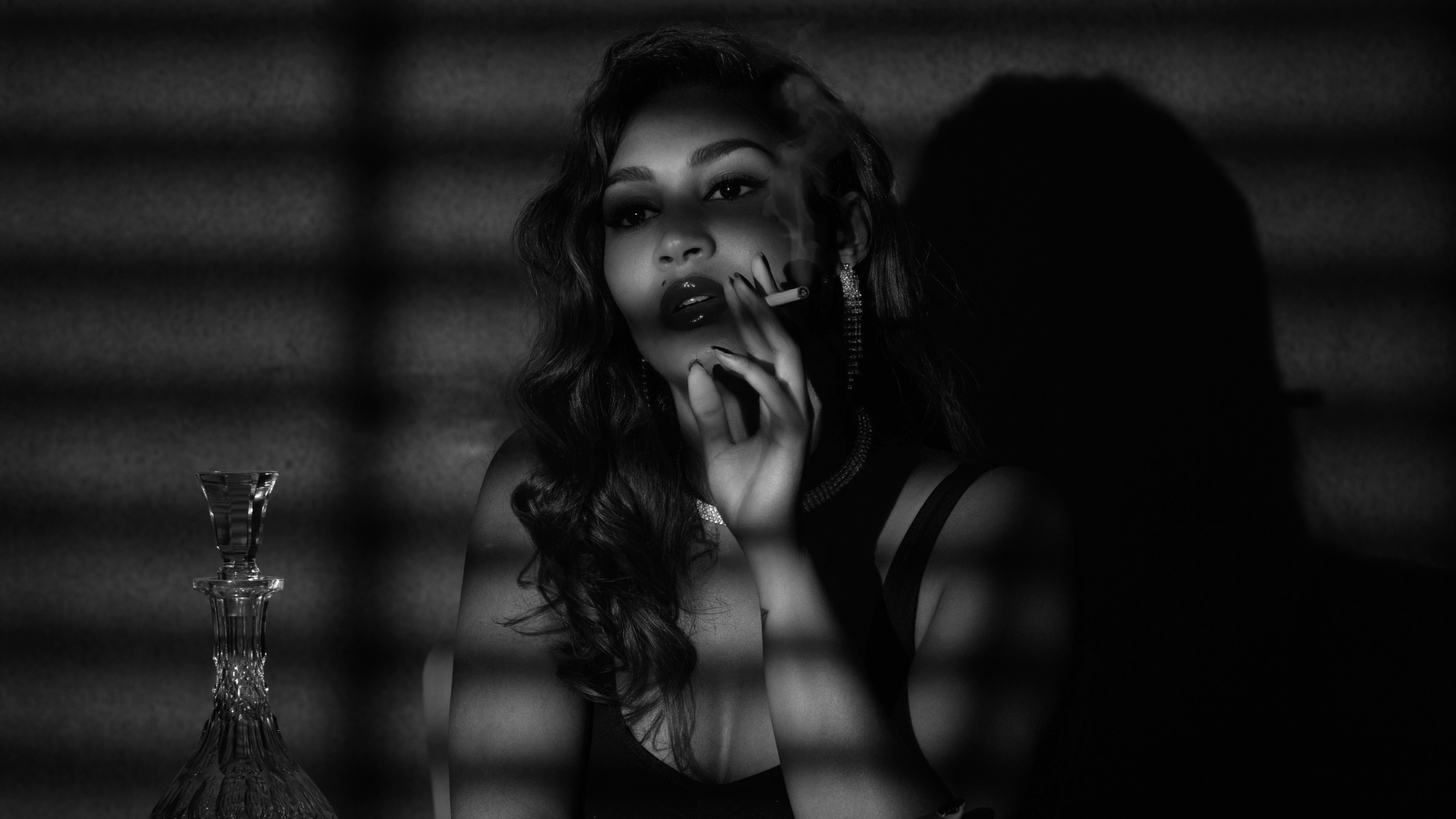 Emulate film noir lighting in a home photography setup, using a