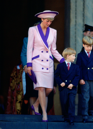 Diana, Princess Of Wales, Puts A Reassuring Hand On Her Son's Shoulder As He Leaves St Paul's Cathedral in 1990