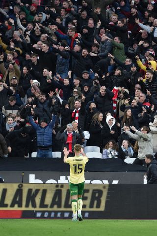 Tommy Conway of Bristol City celebrates scoring his goal in front of his fans during the Emirates FA Cup Third Round match between West Ham United and Bristol City at London Stadium on January 07, 2024 in London, England.