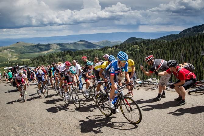 Tom Danielson (Garmin-Sharp) leads what is left of the peloton over the KOM