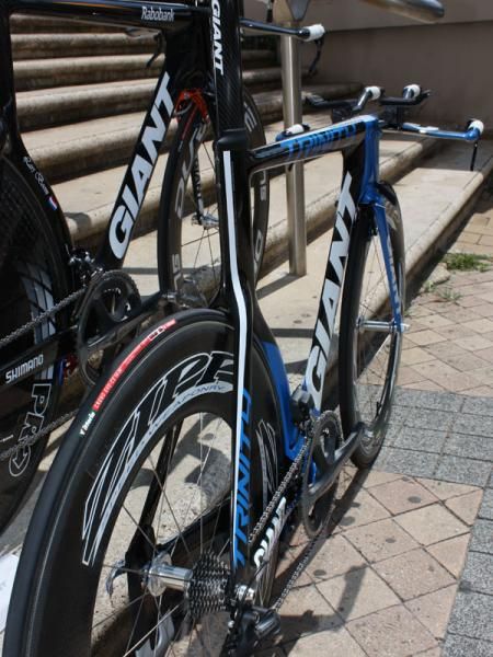 Some team bikes still have their rear brakes mounted on the seat stays but production bikes move them to below the bottom bracket for cleaner lines.
