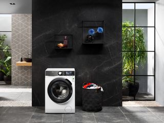 AEG washing machine at home in open space