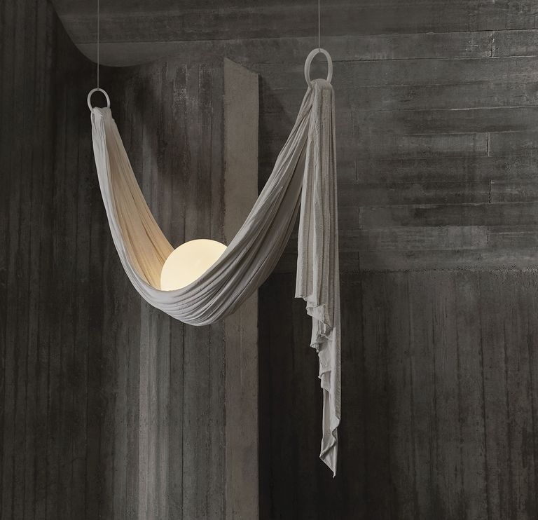 ceiling light that looks like an orb draped in cloth